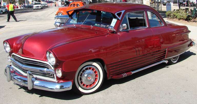 (1 in a multiple picture set)
I thought this 49? Ford couple was beautiful, and reminded me of the customized cars of my youth.