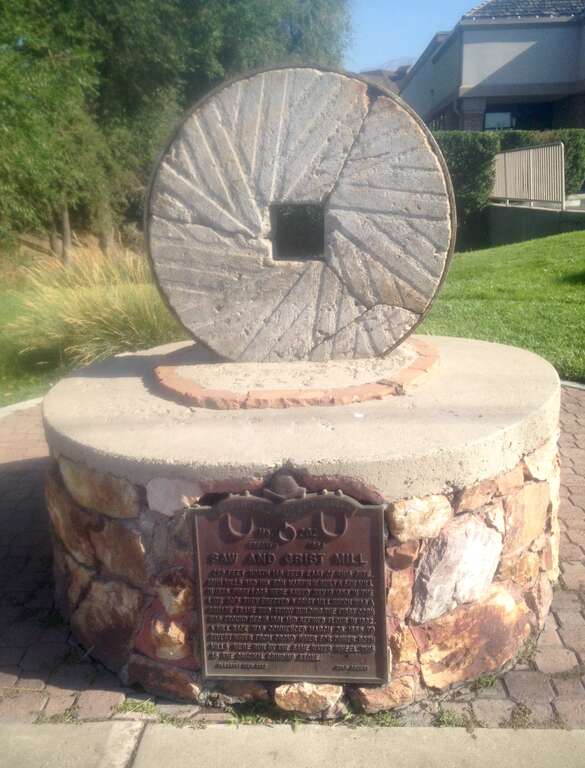 Monument for the Saw and Grist Mill in Provo. It has the original grinding stone.
