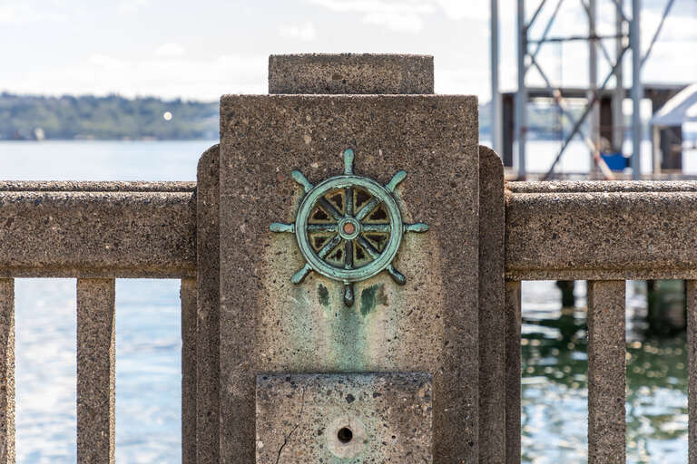 Ornament on a post at the boundary to the water in Seattle, Washington, USA