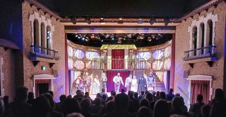 A 2023 production of the musical Something Rotten, at the Garden Theatre in Winter Park, Florida, played on a small stage with costumes indicating the Elizabethan age.