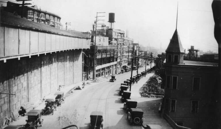 Similar view 12 years earlier.
Western Avenue on the west side of Pike Place Market, Seattle, Washington, 1921. File:Seattle - map - Pike Place Market and vicinity 1920.jpg shows that this neighborhood had a different configuration of streets then