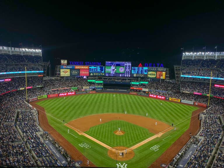 A picture of Yankee Stadium during a game between the Yankees and Pirates.