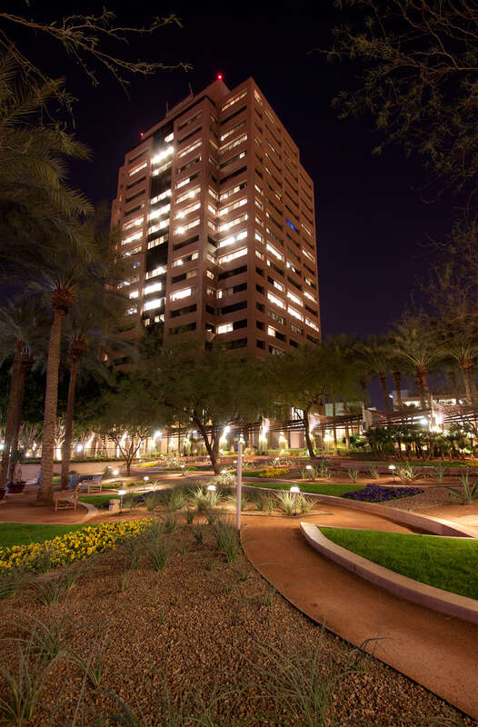 Arizona Public Service (APS) Headquarters as seen from the Arizona Center at night.