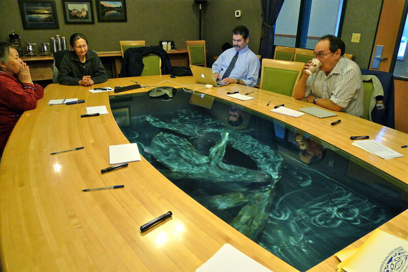 On weather hold for five people who are stuck about 500 miles away.