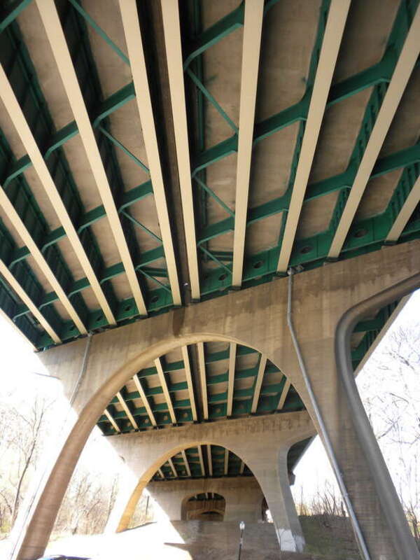 Underside of the Interstate-95 Bridge (newly painted!) crossing Brandywine Creek in Brandywine Park in Wilmington Delaware.