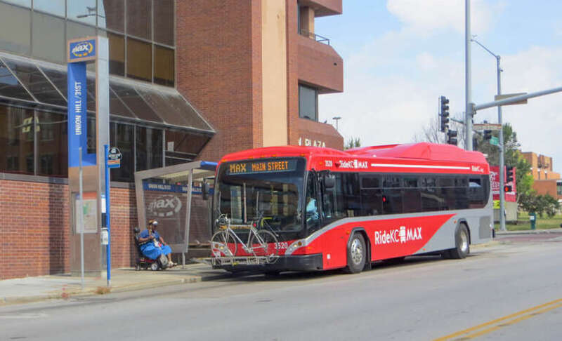 KCATA bus 3520, on the RideKC MAX line, at the southbound Union Hill/31st stop, on Main Street at 31st Street, in Kansas City, Missouri.  Bus  3520 is a 2010 Gillig BRT bus.
