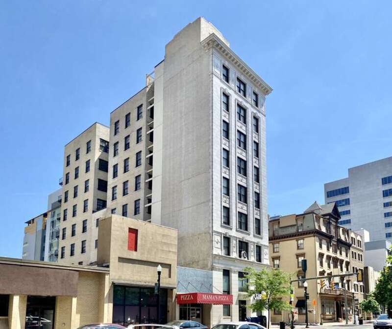 Built in 1913-14, this Renaissance Revival and Chicago School-style building, known as the Kunkel Building or Feller Building, was designed by Mowbray and Uffinger, and was later extended in 1925 with the addition of four bays to the rear of the