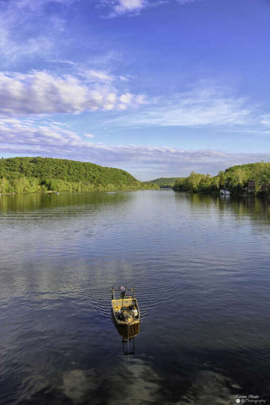 500px provided description: What i like about photographs is that they capture a moment that?s gone forever, impossible to reproduce

-Karl Lagerfeld [#trees ,#sky ,#landscape ,#lake ,#water ,#boat ,#nature ,#river ,#blue ,#canoe ,#photo ,#usa