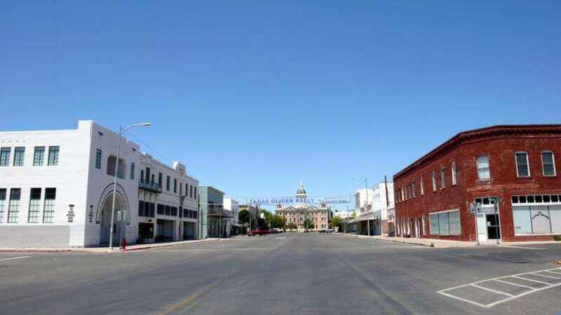 Looking towards the courthouse from intersection of Oak St. and Highland Ave. in Marfa, Texas, USA