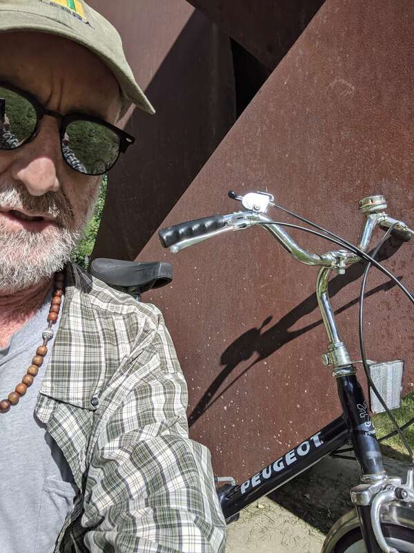 Michael J. Farrand at &quot;Perdido&quot; (1978) sculpture by Clement Meadmore on Dartmouth College in Hanover, New Hampshire.