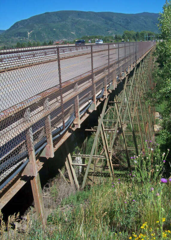 Looking east along the Maroon Creek Bridge along State Highway 82 just outside Aspen, CO, USA