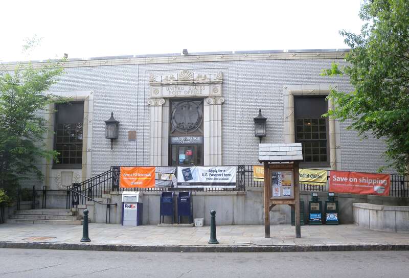 Looking west across Vose Avenue at northern South Orange Post Office on a mostly sunny midday.