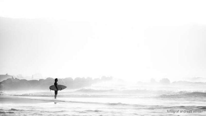 500px provided description: The Surfer And The Sea [#sunset ,#beach ,#bw ,#rock ,#waves ,#silhouette ,#surfing ,#surfer ,#hawaii ,#surf ,#haze ,#pipeline ,#piles ,#oahu ,#surfboard ,#northshore ,#surferphotos]