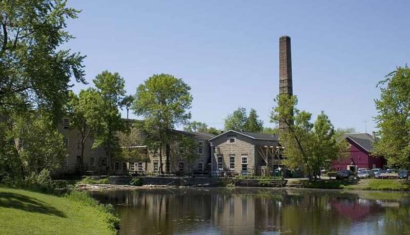 The Hilgen-Wittenberg Woolen Mill complex in Cedarburg, Wisconsin. National Registered Historic Place. View looking west across the mill pond.