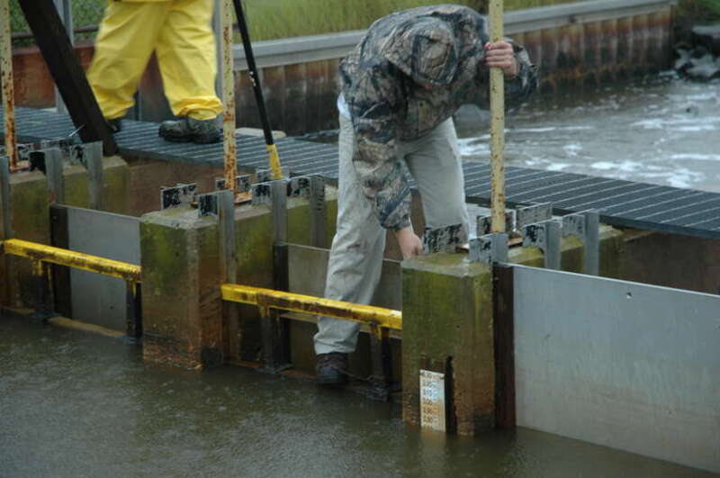 The YCC crew monitors water levels at Prime Hook National Wildlife Refuge.