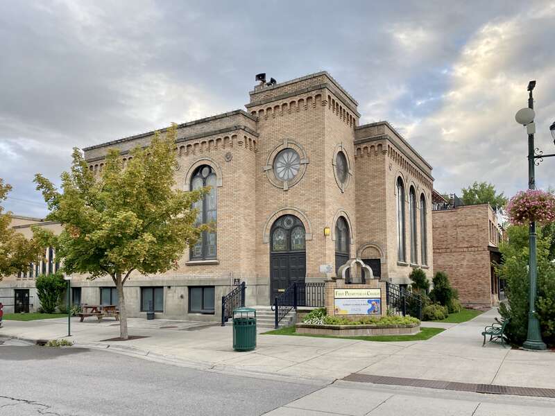 Built in 1921, this stripped and stark Romanesque Revival-style church, home to a Presbyterian congregation, stands at the corner of Central Avenue and 3rd Street in downtown Whitefish, Montana.