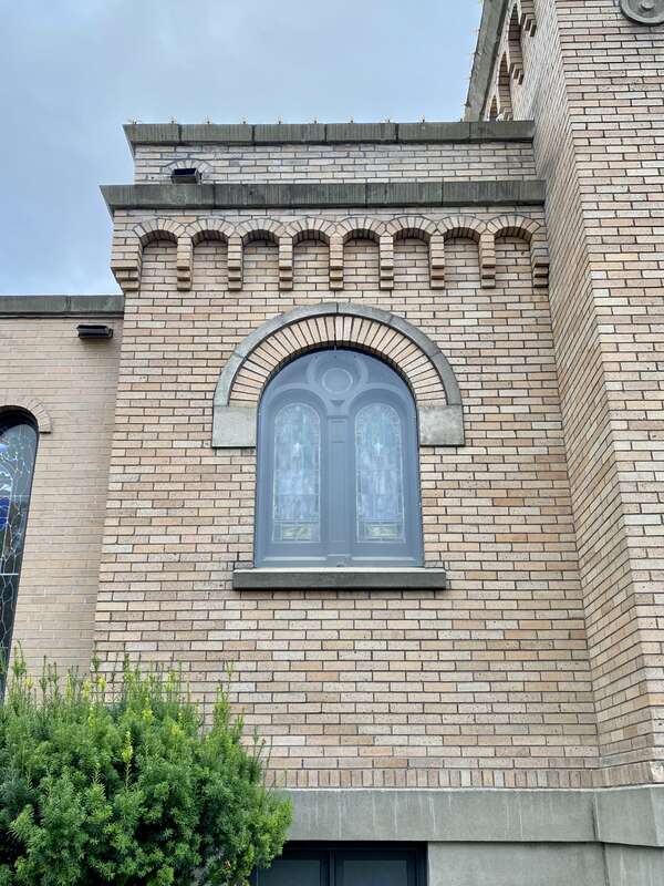 Built in 1921, this stripped and stark Romanesque Revival-style church, home to a Presbyterian congregation, stands at the corner of Central Avenue and 3rd Street in downtown Whitefish, Montana.