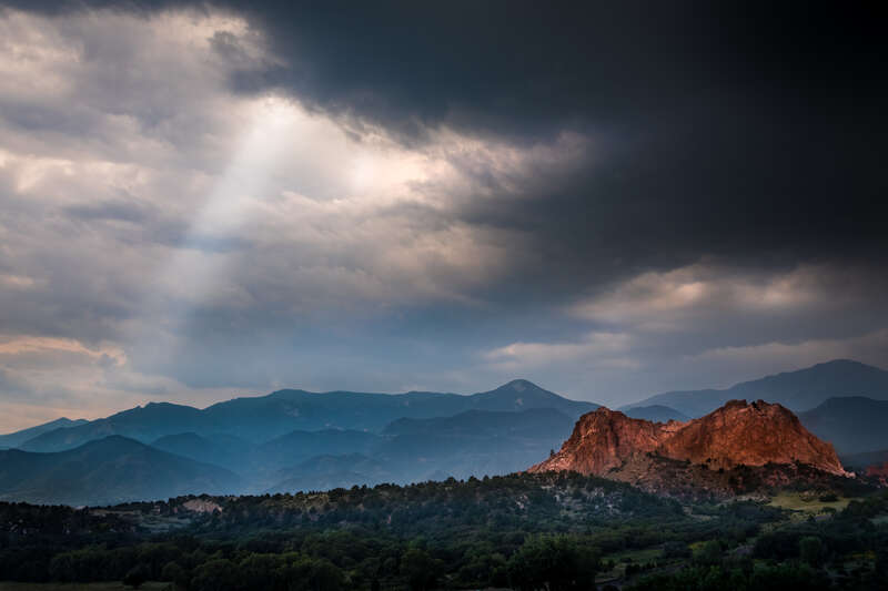 Sleeping Giant and Cathedral Rock in the Garden of the Gods Park, Colorado Springs, Colorado, US.     A view of part of the larger features in the park from the balcony of the visitor center with a storm coming in.  It rained pretty hard for an hour