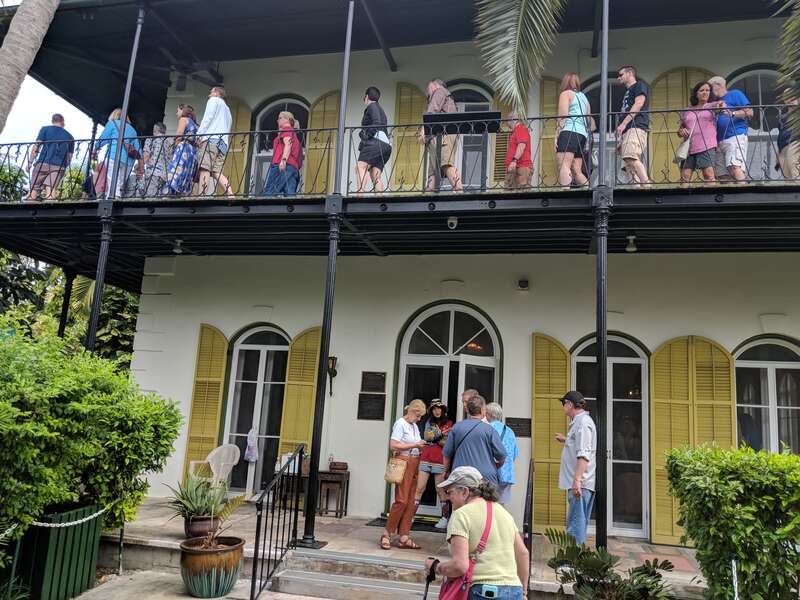 Tourists visiting the Hemingway House in Key West, Florida. Photo by Jim Heaphy.