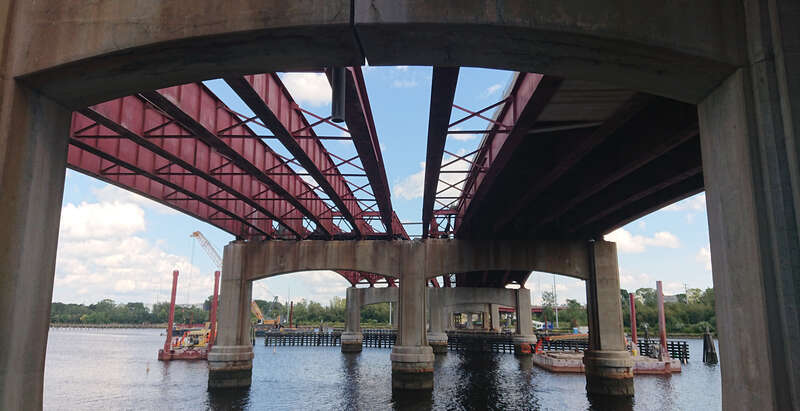 Demolition of the Henderson Bridge, Providence, Rhode Island, in September 2021 showing the roadway has been removed from one side of the bridge. Taken from the Providence end facing east.