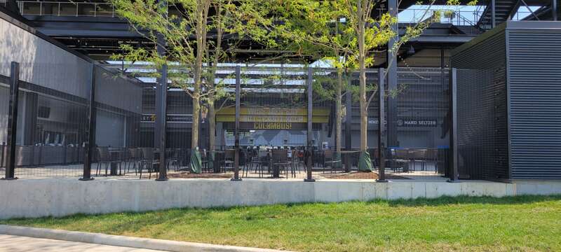 A beer garden located at the supporter's section, Nordecke, of Lower.com Field. One of the chants (&quot;Wise Men Say&quot;) is printed at the top of the main entrance to Nordecke.