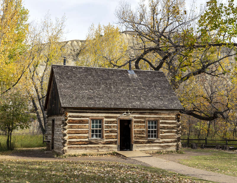 The Maltese Cross ranch cabin at the south unit visitor center, Theodore Roosevelt National Park, North Dakota, USA