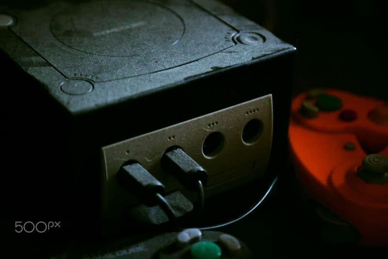 500px provided description: Old, dusty Gamecube [#arizona ,#hobby ,#games ,#video ,#mario ,#video games ,#gamecube ,#nintendo ,#controlers]