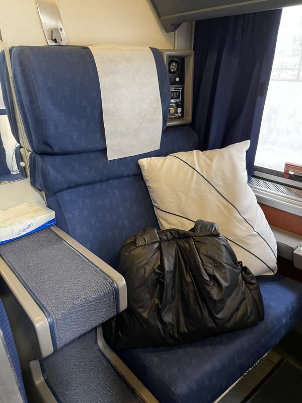 Roomette 2 on California Zephyr with a CARAA travel bag on the seat.