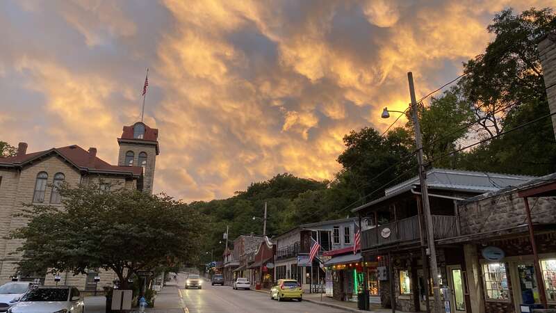 A beautiful sky over Main Street in downtown Eureka Springs.  The Carroll County Courthouse is seen on the left.