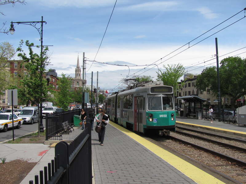 Looking inbound at St. Marys Street MBTA station on the Green Line C Branch, Boston Massachusetts - the CITGO sign is visible in the background.