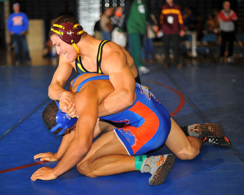 Tommy Burriel has Cody Dixon in a three-quarter nelson. 
Championship Third Round, Bout 1063, Tommy Burriel (Arizona State) DEC Cody Dixon (Boise State) M 11-1. 

2011 in Reno, Nevada, United States.