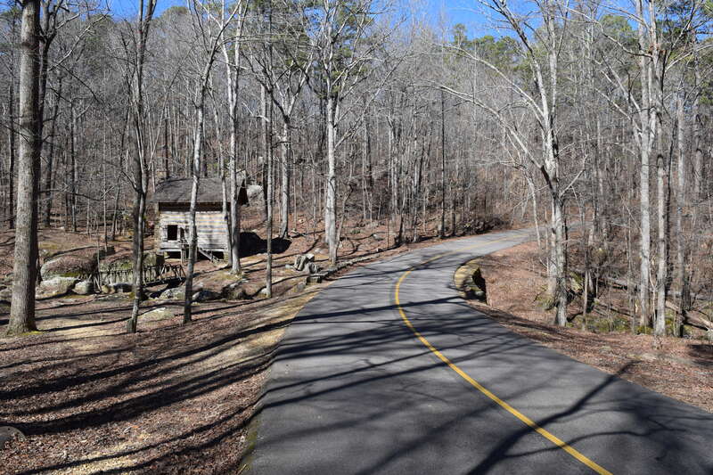 Park road and Pioneer Cabin in Tishomingo State Park, Mississippi