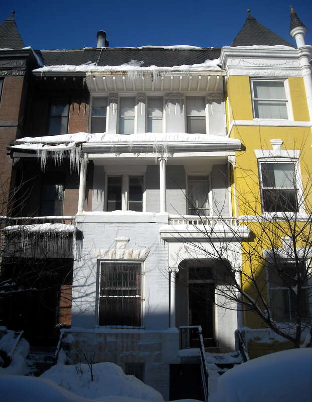 A converted row house located at 1414 Hopkins Street, N.W., (between 20th, 21st, O and P Streets, N.W.) in the Dupont Circle neighborhood of Washington, D.C., following the Second North American blizzard of 2010.
Built in 1897, the Italianate,