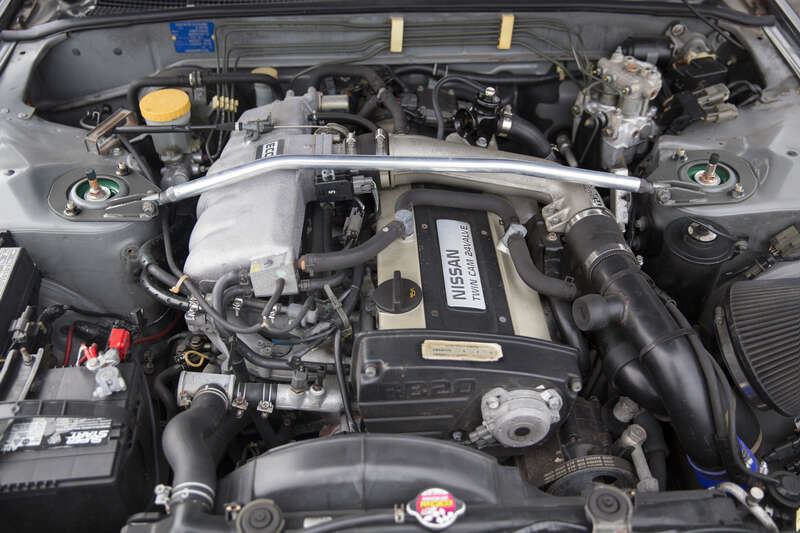 The two-liter turbocharged twin-cam RB20DET engine in a 1990 Nissan Skyline GTS-4 four-door sedan (HNR32).