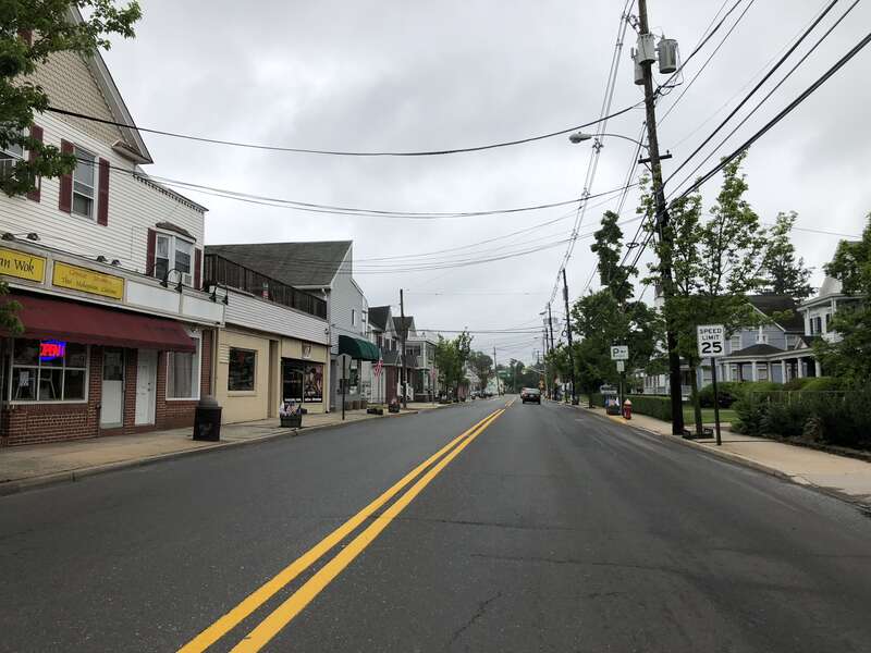 View east along Monmouth County Route 522 and south along Monmouth County Route 527 (Main Street) at Wood Avenue in Englishtown, Monmouth County, New Jersey