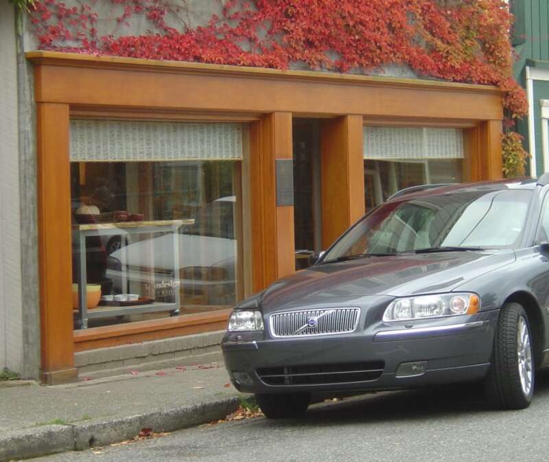 This is a shop in the town of Langley on Whidbey Island, Washington.

I took the picture because I liked the wood, the big windows, and the ivy.