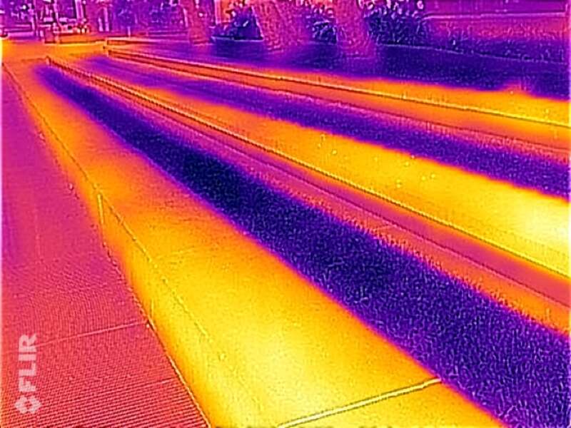 Alternating strips of concrete and grass