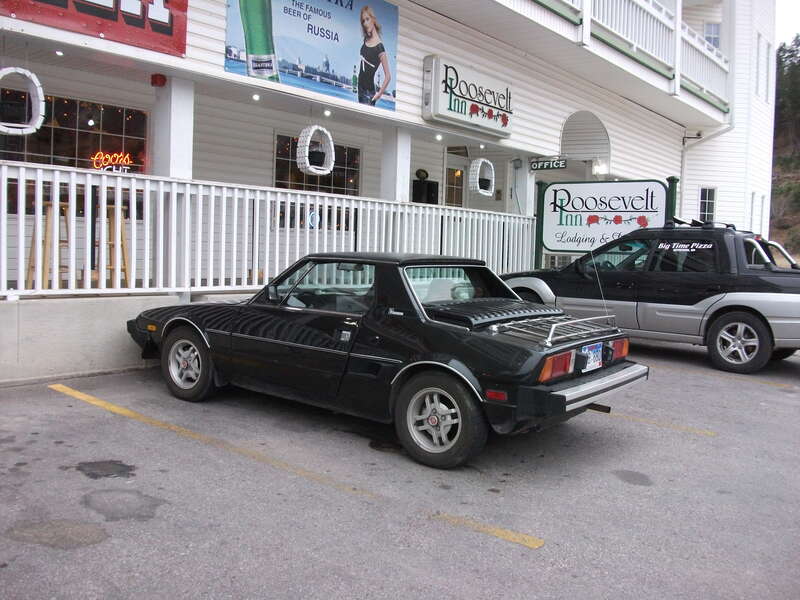 A rather nice Bertone X19 outside a hotel near Mount Rushmore in South Dakota in a place called Keystone. Pretty much everything was closed for the season except this place. Bonus Subaru Baja behind.