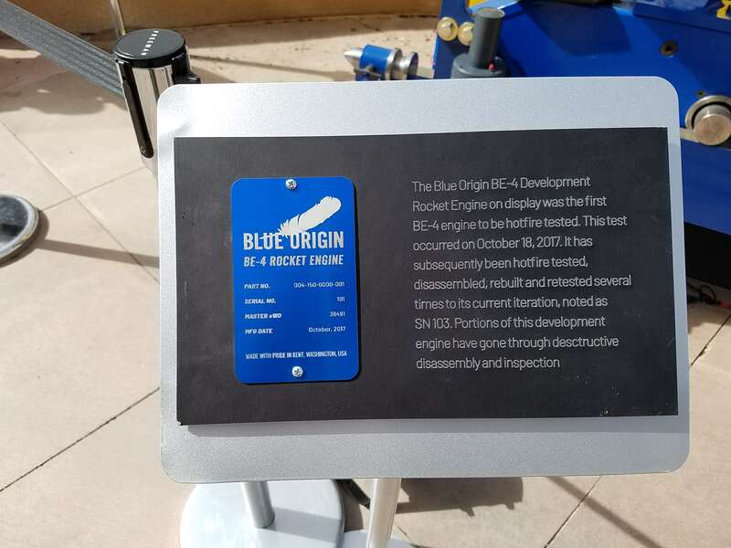 The plate reads:
BLUE ORIGIN
BE-4 ROCKET ENGINE
Part no. 004-150-0000-001
Serial no. 101
Master eWO 36491
Mfg date October, 2017
Made with Pride in Kent, Washington USA

"The BE-4, originally serial number 101, was manufactured in Kent, Washington