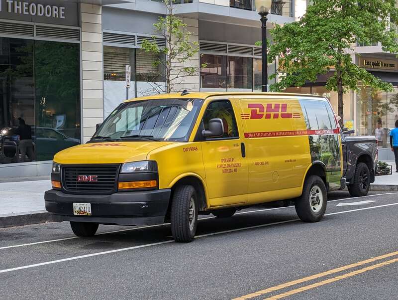 DHL van parked in bike lane at CityCenter in Washington, D.C.