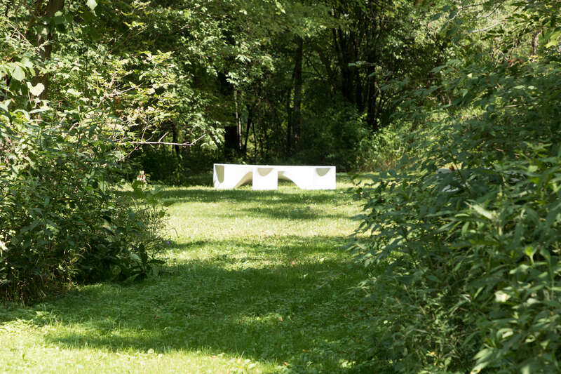 Outdoor furniture, walking path of Farnsworth House, Plano, Illinois.