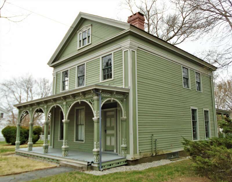 The George Greenman House at 47 Greenmanville Avenue in Mystic, Connecticut was built in 1839 in the Greek Revival style for George Greenman, the oldest of three brothers who founded the George Greenman &amp;amp; Co. shipyard. The porches with their
