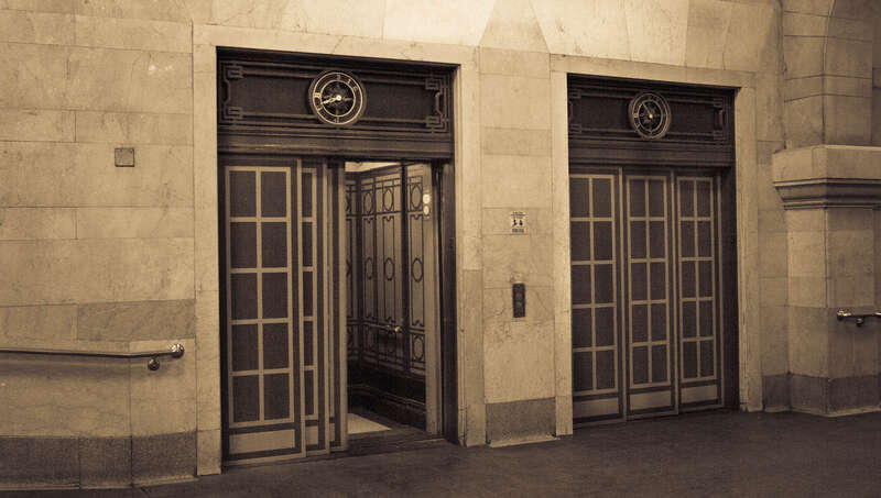 500px provided description: Grand Central Elevators [#architecture ,#building ,#sepia]