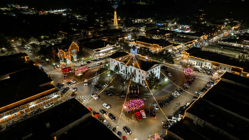 The beautiful Oxford Square lit up with lights for the holiday season.