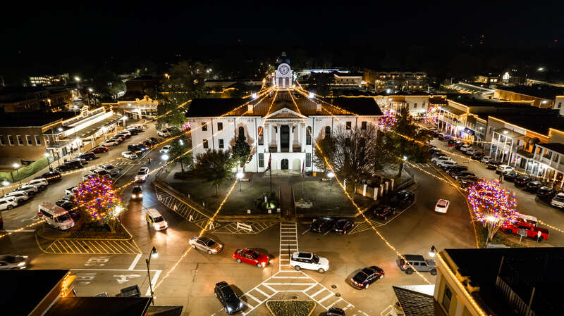 The beautiful Oxford Square lit up with lights for the holiday season.