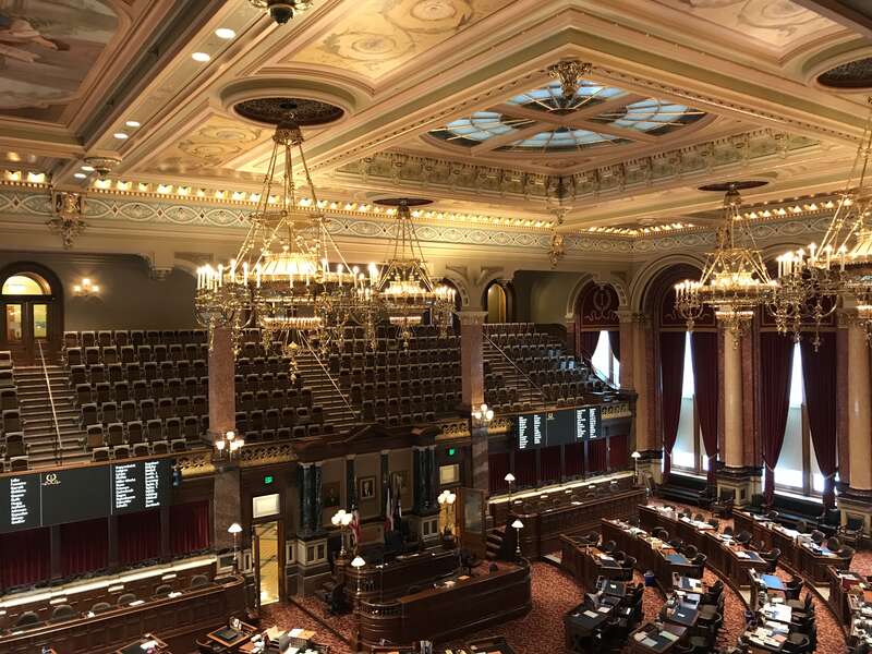 This is the Iowa Senate from a balcony. There were still files on the desks below from a previous Senate meeting.
