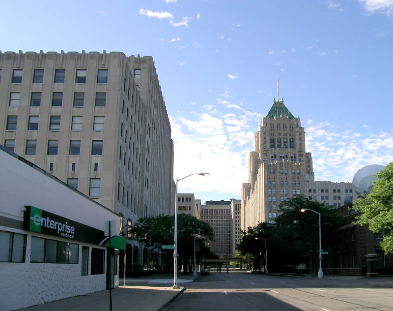 Albert Kahn Building (left) and Fisher Building (right) in Detroit MI.  Cadillac PLace is in the background.