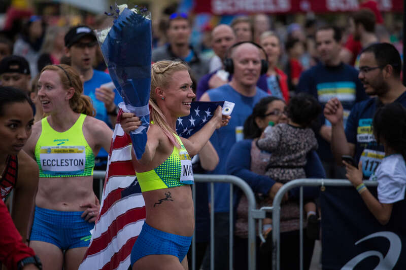 The women's national champion Katie Mackey ran a time of 4:37 in the mile.
Photos from the 8th annual Grand Blue Mile, which includes the U.S. Track &amp;amp; Field 1 Mile Road Championship race.