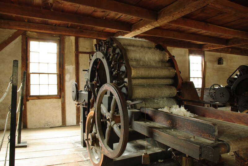 Taken at Old Sturbridge Village, Gallery of the Mill Neighborhood, One of the machines in the carding mill, taken April 18, 2009.  This machine is restored and is operated on a regular basis
