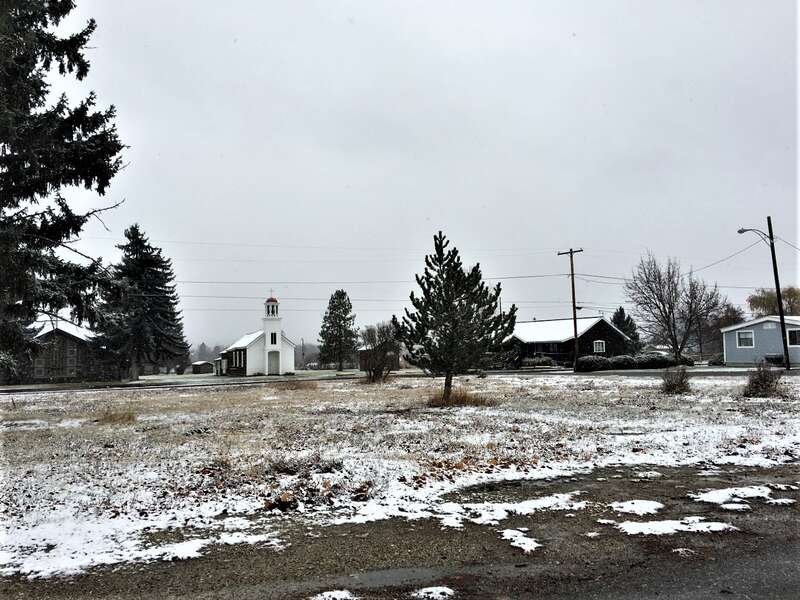 Perry Foust House  Scene is the site of the Foust House, of which there is no remaining trace.  Saint Mary's Mission is shown in the background.